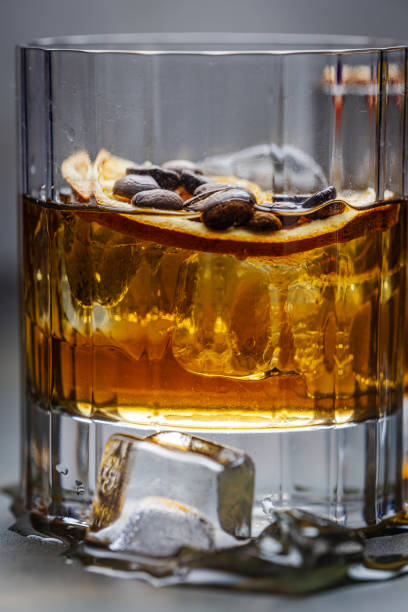 istock Glass with drinks on a bar table and ice cubes 2200010681
