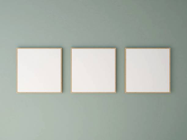 istock Mockup of three square frames on a green wall 2200013935