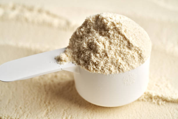 istock Whey protein powder in a measuring spoon 2200015985