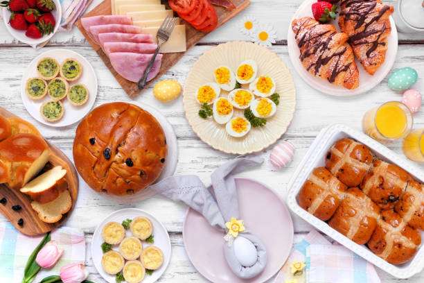 istock Easter breakfast or brunch table scene. Overhead view on a white wood background. 2200017243