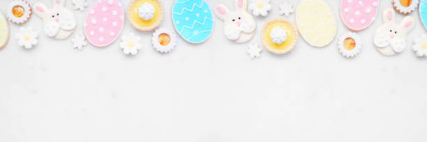 istock Easter or spring themed baking top border  on a white marble banner background 2200017468