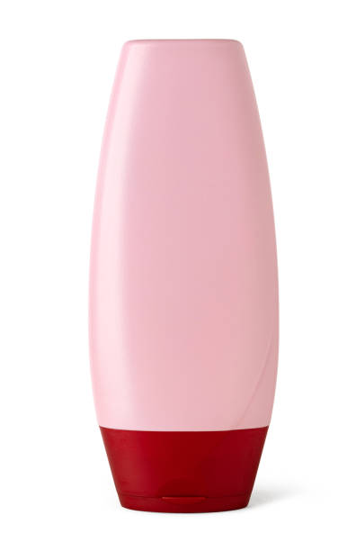 istock Pink bottle with red cap for cosmetic products 2200017493