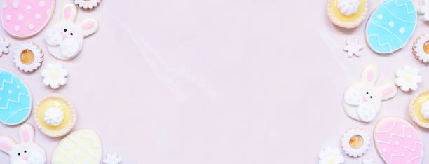 istock Easter or spring themed baking double border on a pink stone banner background 2200018207