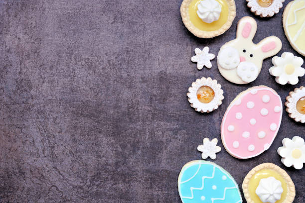istock Easter or spring themed baking side border on a dark stone background 2200018396