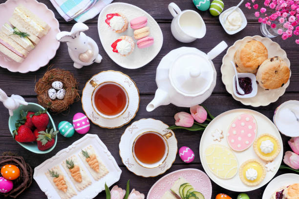 istock Easter or spring tea table scene against a dark wood background 2200018939