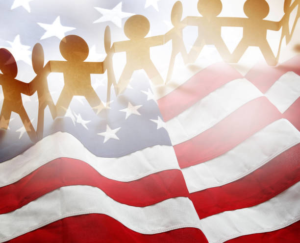 Team holding hands united on America flag
