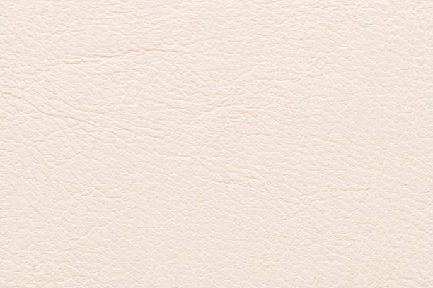 istock Cream-colored leather with a textured surface, suitable for upholstery or clothing. 2200028710