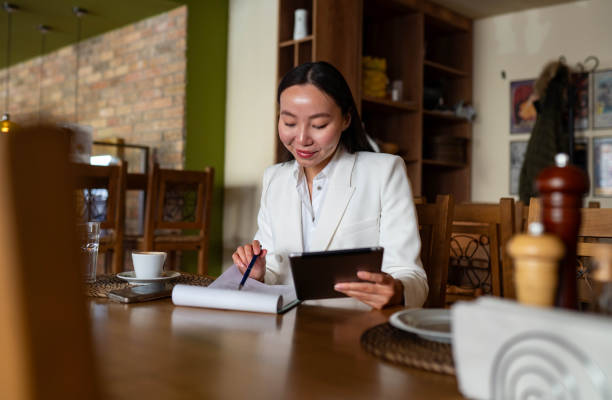 istock Successful businesswoman using laptop 2200029506