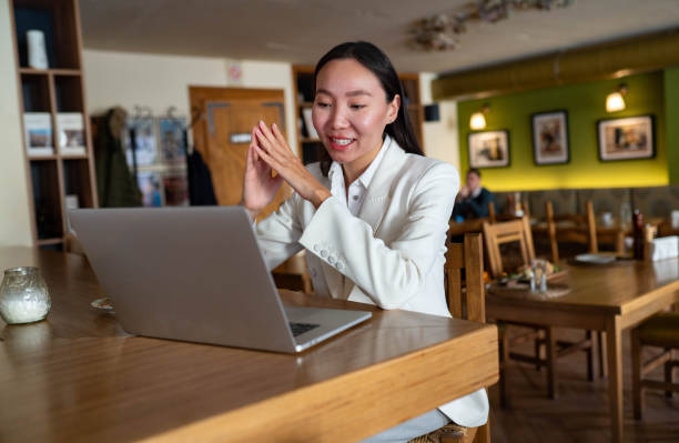 istock Business woman having an online conversation 2200029628
