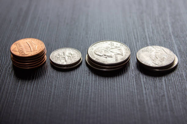 istock American coins on black background 2200033613