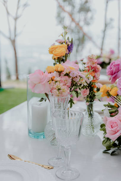 istock A dreamy wedding floral arrangement bursting with soft pastels and lush greenery, capturing the essence of spring romance 2200037493