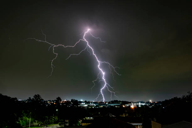 istock A dramatic photograph capturing powerful lightning strikes illuminating the dark sky. 2200042694