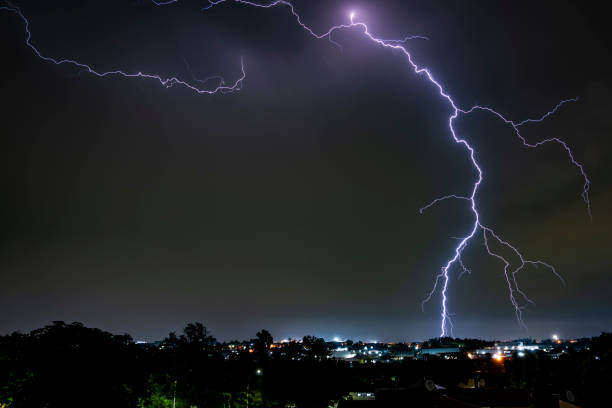 istock A dramatic photograph capturing powerful lightning strikes illuminating the dark sky. 2200042704