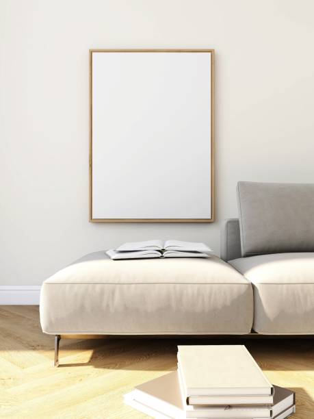 istock Living room with blank vertical frame mockup, beige sofa and table with books 2200051056