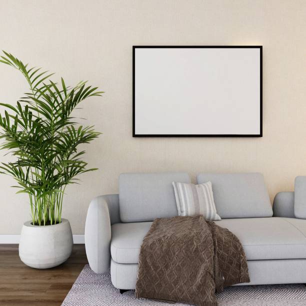 istock Living room with a horizontal frame mockup on a beige wall and interior decoration 2200051248