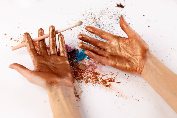 Creative Expression with Art Supplies: Hands Covered in Vibrant Colors and Glitter After Artistic Endeavors, Showcasing Beauty Through Colorful Messiness and Inspiration