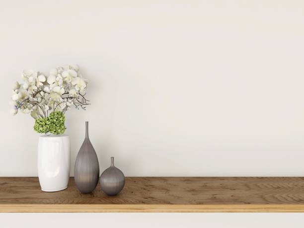 istock Wall mockup with ornamental plant and table decorations 2200052583
