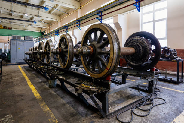 istock Steel train wheels at service in wagon repair workshop 2200052792