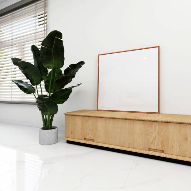 Simple living room with ornamental plants, window and square frame