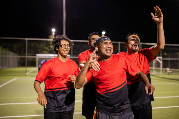 istock Soccer Team Celebrating Victory 2200053076