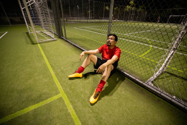 istock Tired Soccer Player After a Lost Match 2200056061