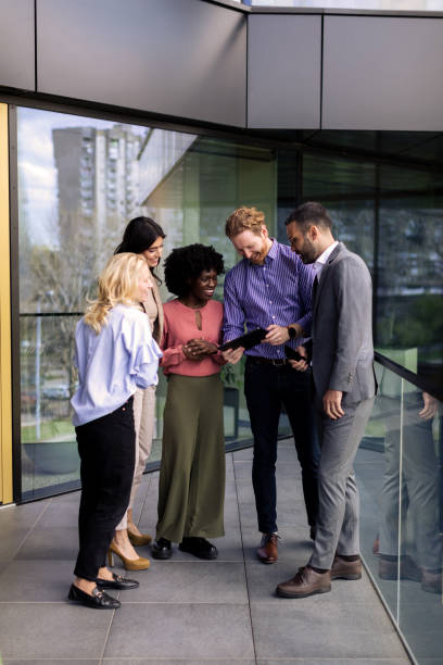 istock Business team walking in the office 2200056278