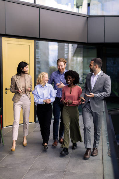 istock Business team walking in the office 2200056282