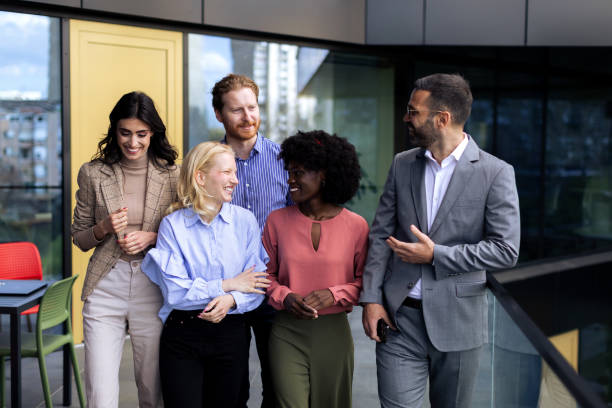 istock Business team walking in the office 2200056306