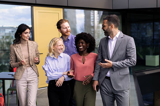 istock Business team walking in the office 2200056326