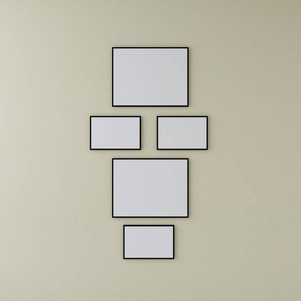 istock Mockup of five blank horizontal frames on a light beige wall 2200056729