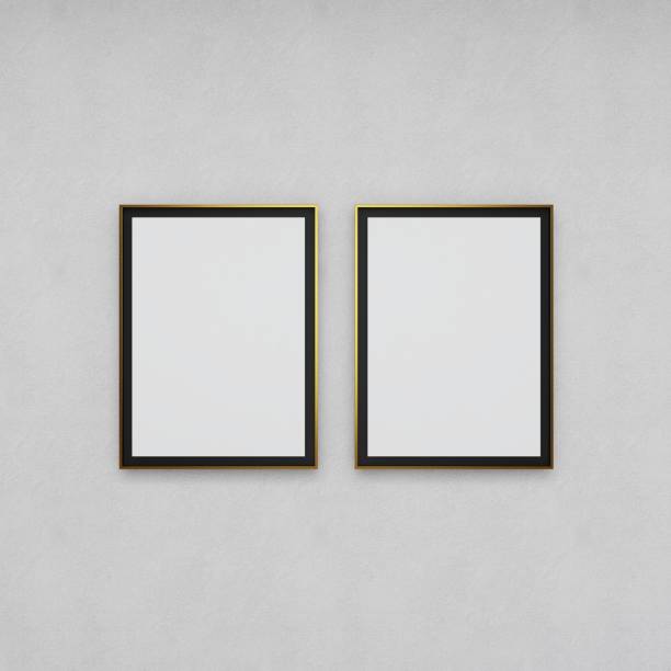 istock Mockup of two blank vertical frames on a white wall 2200056759