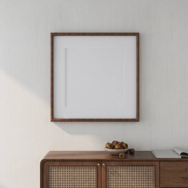 Blank square frame mockup on white wall with sideboard in decoration