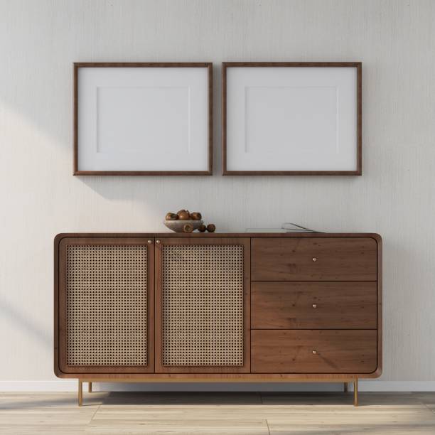 istock Mockup of two blank horizontal frames on a white wall with sideboard in the decoration 2200056794