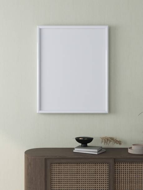 istock Blank vertical frame mockup on a green wall with sideboard in the decoration 2200056812