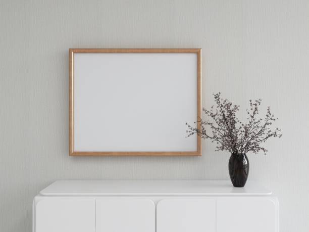 istock Blank horizontal frame mockup on a wall with white sideboard in decoration 2200056836