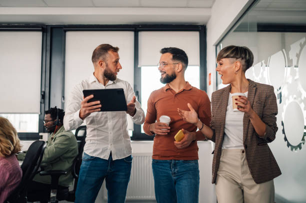 istock Business team discussing a project using a digital tablet in the office 2200058604