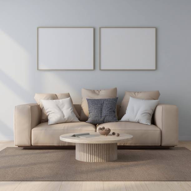istock Living room with two horizontal frame mockups, beige sofa and interior decoration 2200060484