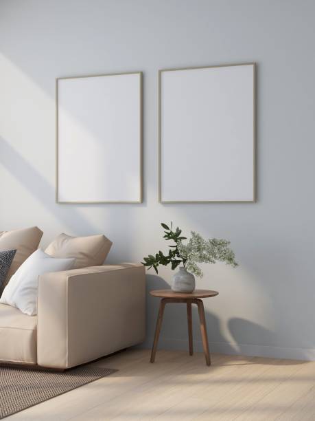 istock Living room with two vertical frame mockups, beige sofa and interior decoration 2200060492