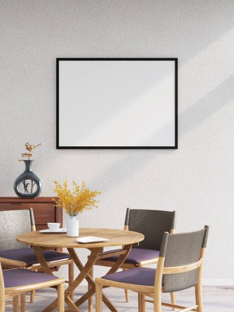 istock Horizontal frame mockup on a white wall, table with chairs and table decorations 2200062998