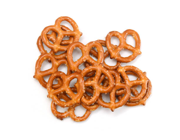istock Crispy pretzels on white background 2200063613