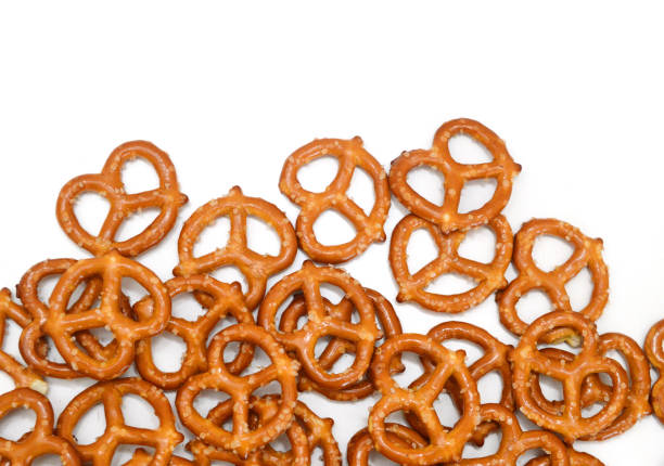 istock Crispy pretzels on white background 2200063828
