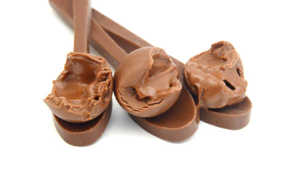 istock Chocolate candies isolated on white background 2200064033