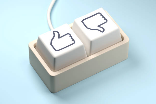 A close-up of a computer keyboard featuring two buttons: Like and \