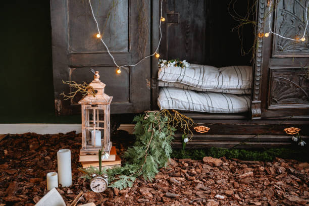 istock Cozy interior with lantern and greenery in a nature-inspired setting 2200065885