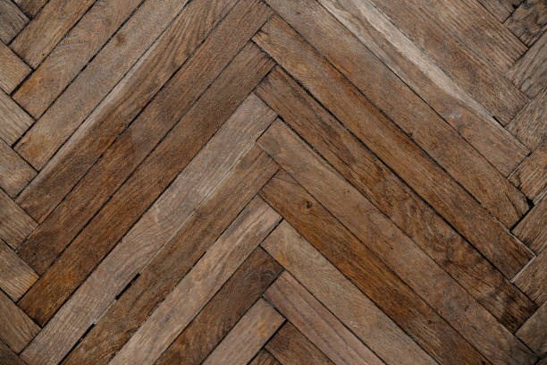 istock Wooden herringbone pattern flooring showcasing natural texture and warmth 2200065896