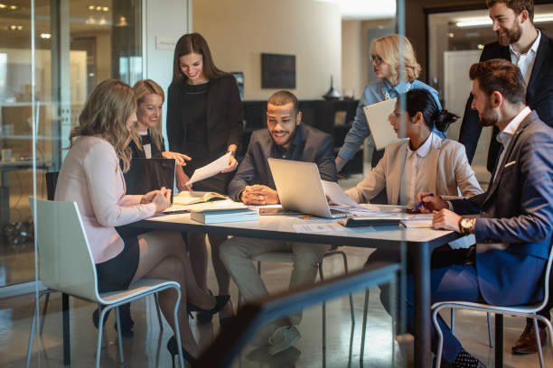 istock Diverse Executives Engaging in Strategy Meeting at Work 2200067087