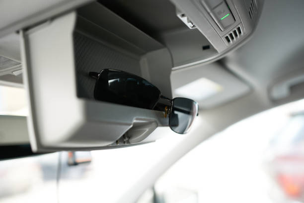 istock Sunglasses in a storage compartment in a modern car. 2200081939