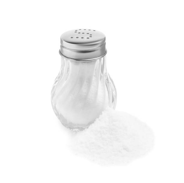 istock Natural salt and glass shaker isolated on white 2200084985