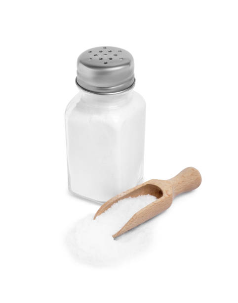 istock Natural salt in shaker and scoop isolated on white 2200085054