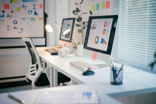 istock Modern office workstation illuminating marketing data analysis on computer screens, showcasing professional workspace with analytical charts and graphs 2200085529